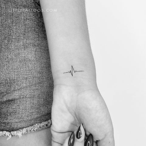 Tattoo Designs For Girls On Hand Heart Beats | Name tattoos on wrist, Small  heart tattoos, Heart tattoo