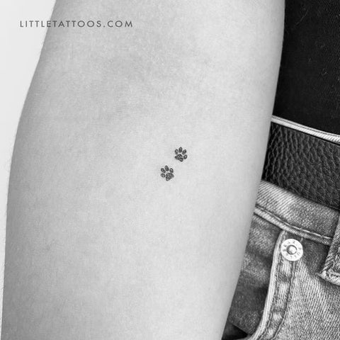 Dog tattoos: Paw prints little tattoo