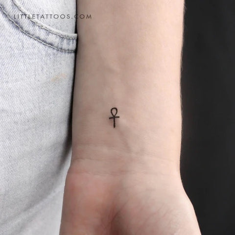 Egyptian symbol tattoos: Iittle fine line Ankh tattoo