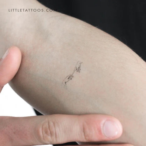 Faith tattoos: Creation of Adam tattoo