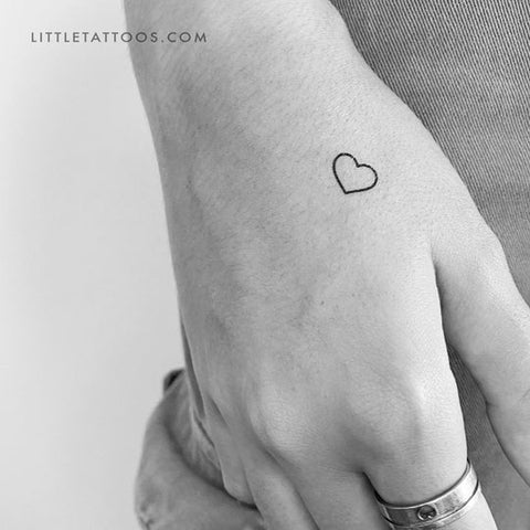 Hailey Bieber's tattoos: Heart Outline Tattoo