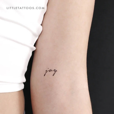 Mantra tattoos: Joy quote tattoo