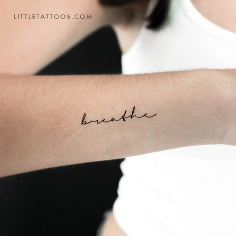 Mindfulness tattoos: Breathe handwriting tattoo