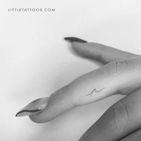 Mindfulness tattoos: Tiny wave finger tattoo