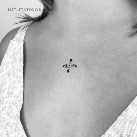 Mindfulness tattoos: black small mindfulness symbol tattoo