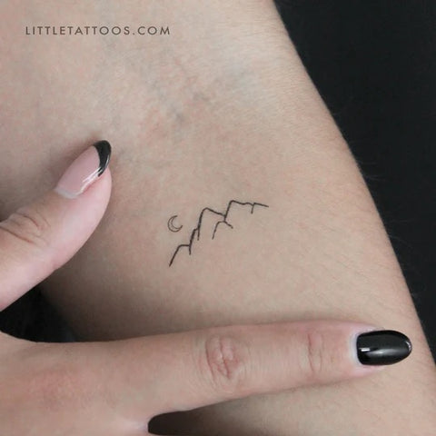 Nature tattoos: Fine line mountain and moon tattoo
