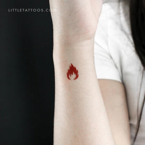 Red tattoos: Red fire flame tattoo