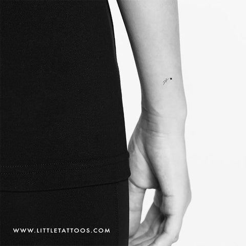 Shooting star tattoos: Small shooting star tattoo on the wrist