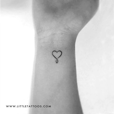 interlocking heart tattoo