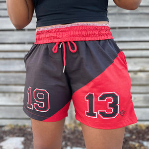 1913 shorts - The PeQuliar Sunflower, LLC