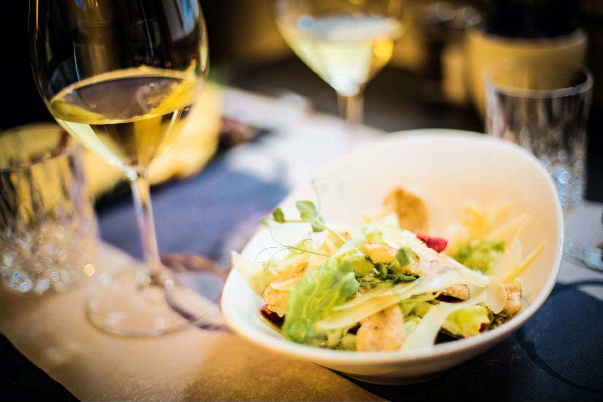 Wine Glass Next to Salad