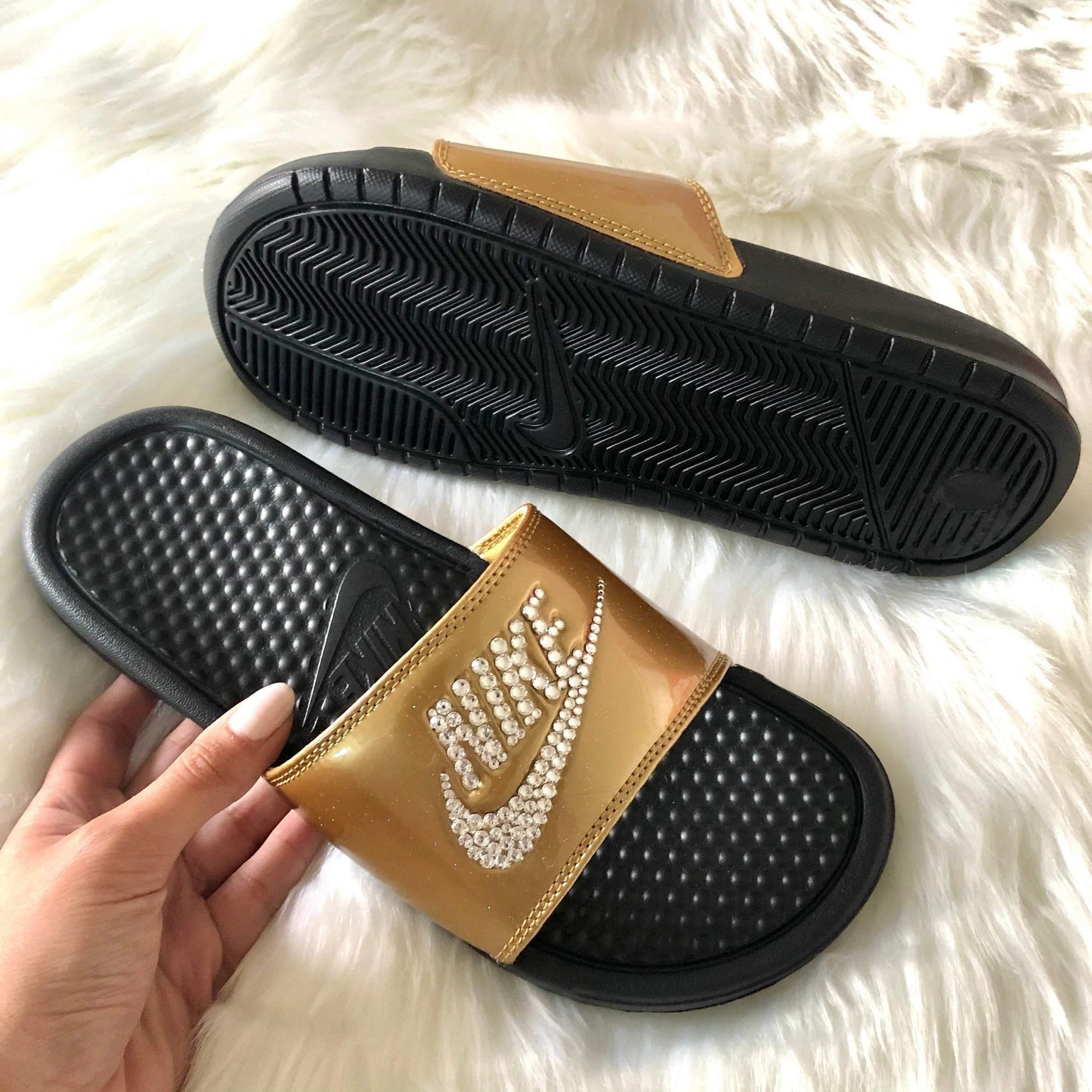 nike slides gold swoosh