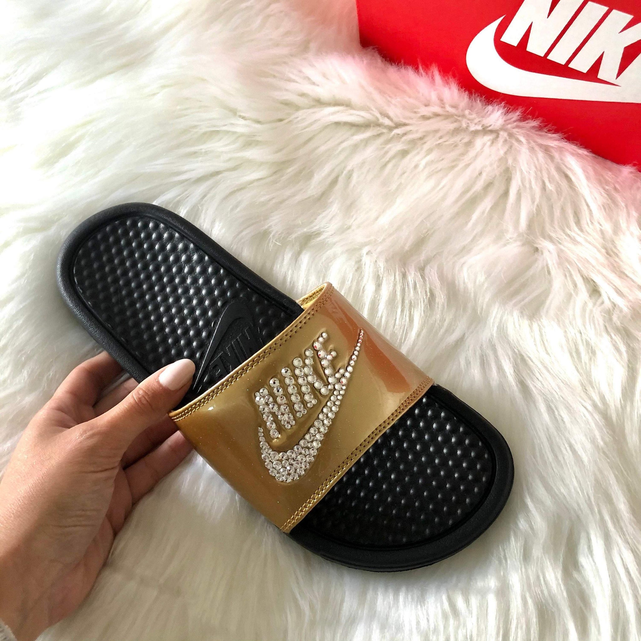 nike slides gold swoosh