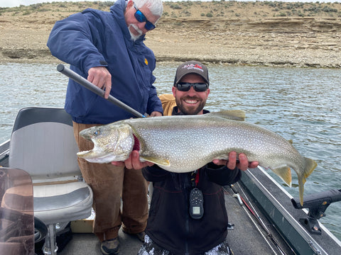 Patrick with large lake trout