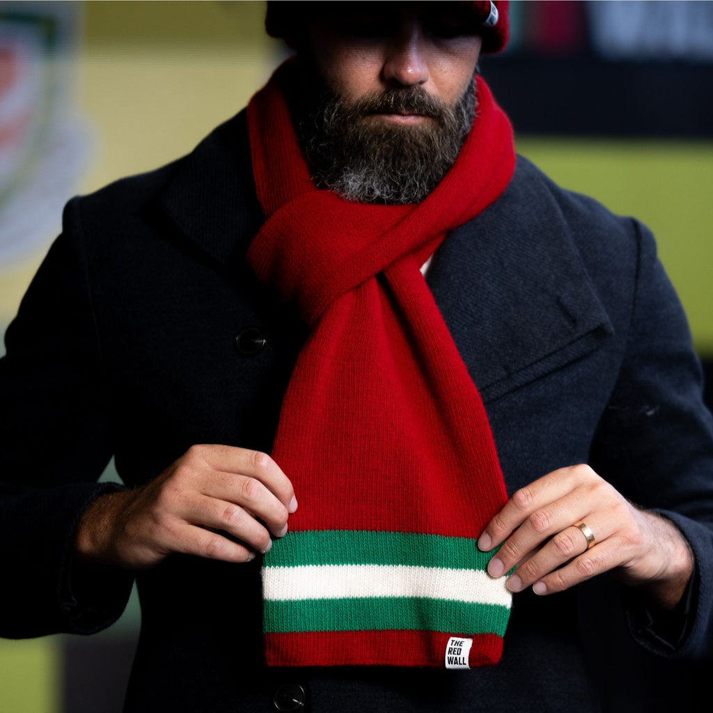 man wearing official Welsh football scarf