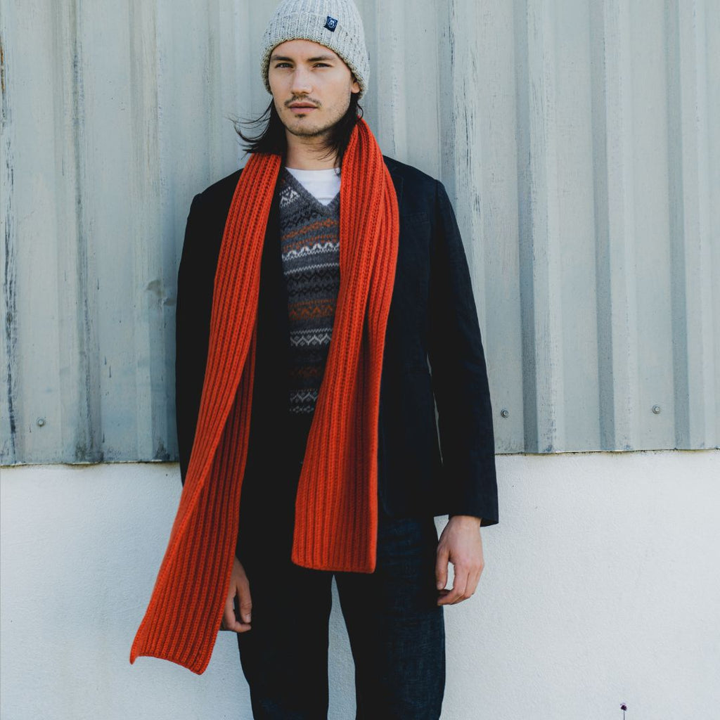 man wearing red scarf