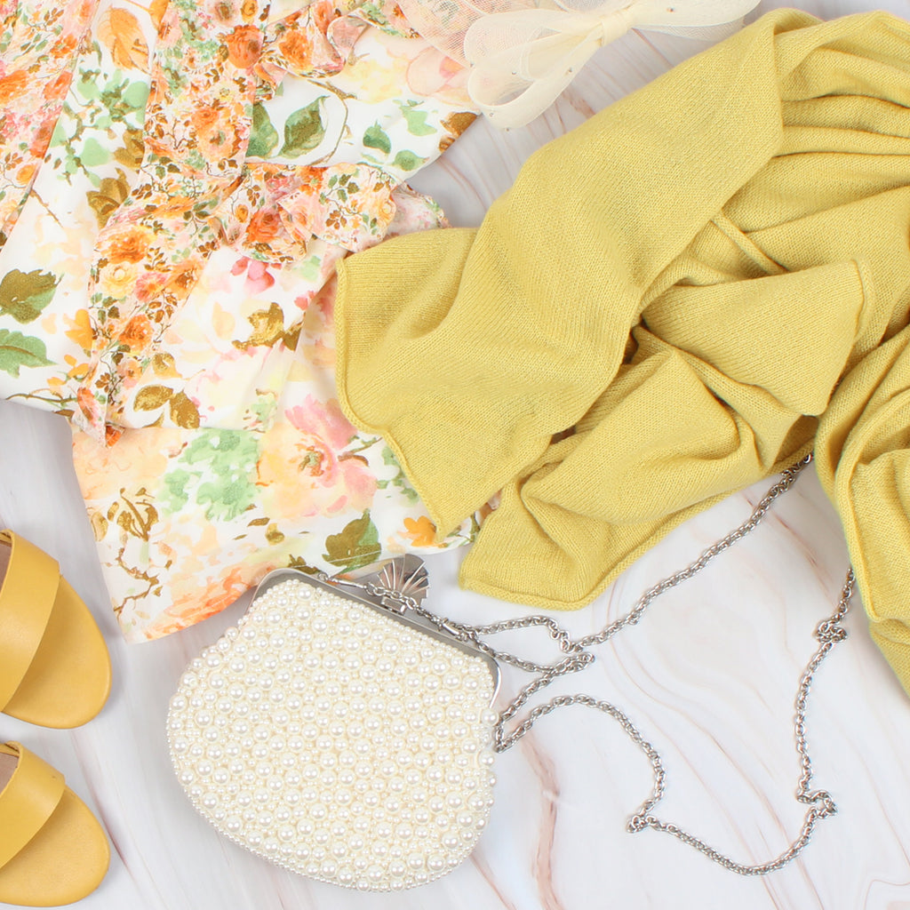 women's yellow cashmere poncho flat lay