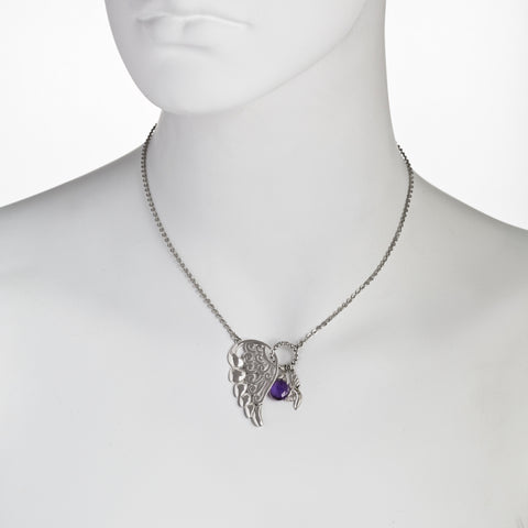 angel with wings holding blue amethyst pendant