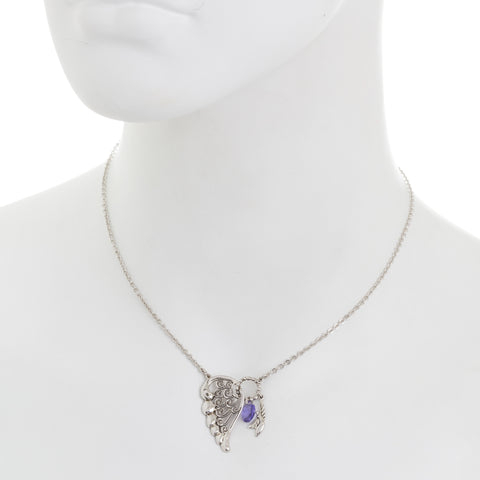 angel with wings holding blue amethyst pendant