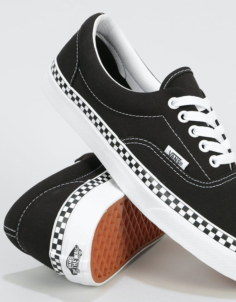 vans era checker foxing