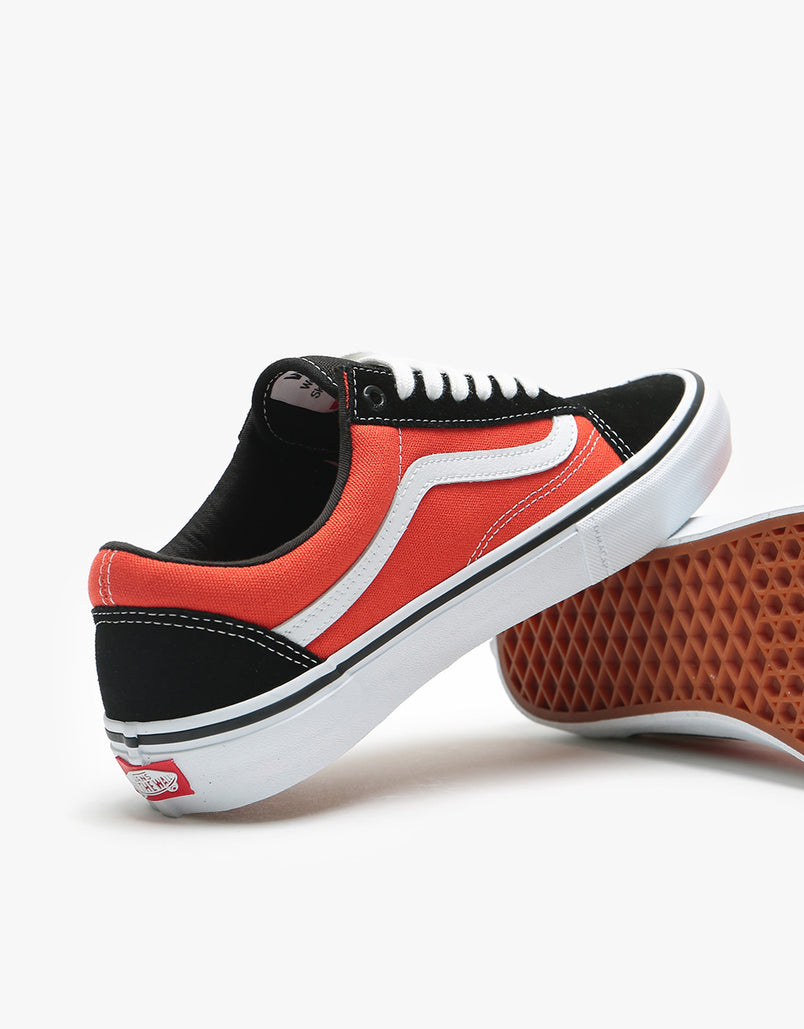 orange and black vans old skool