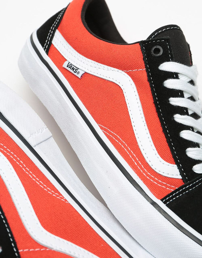 orange and black vans old skool