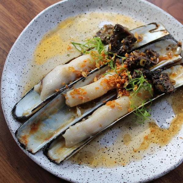 razor clams in green crab butter