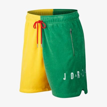 green and yellow jordan shorts