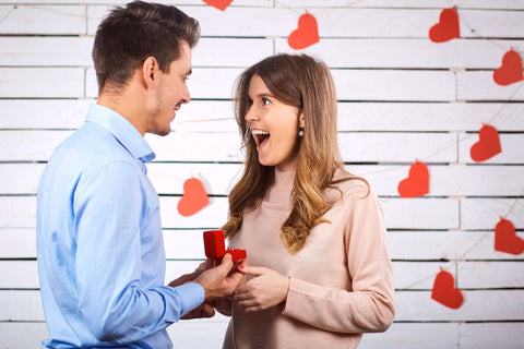 A boyfriend proposing to his girlfriend