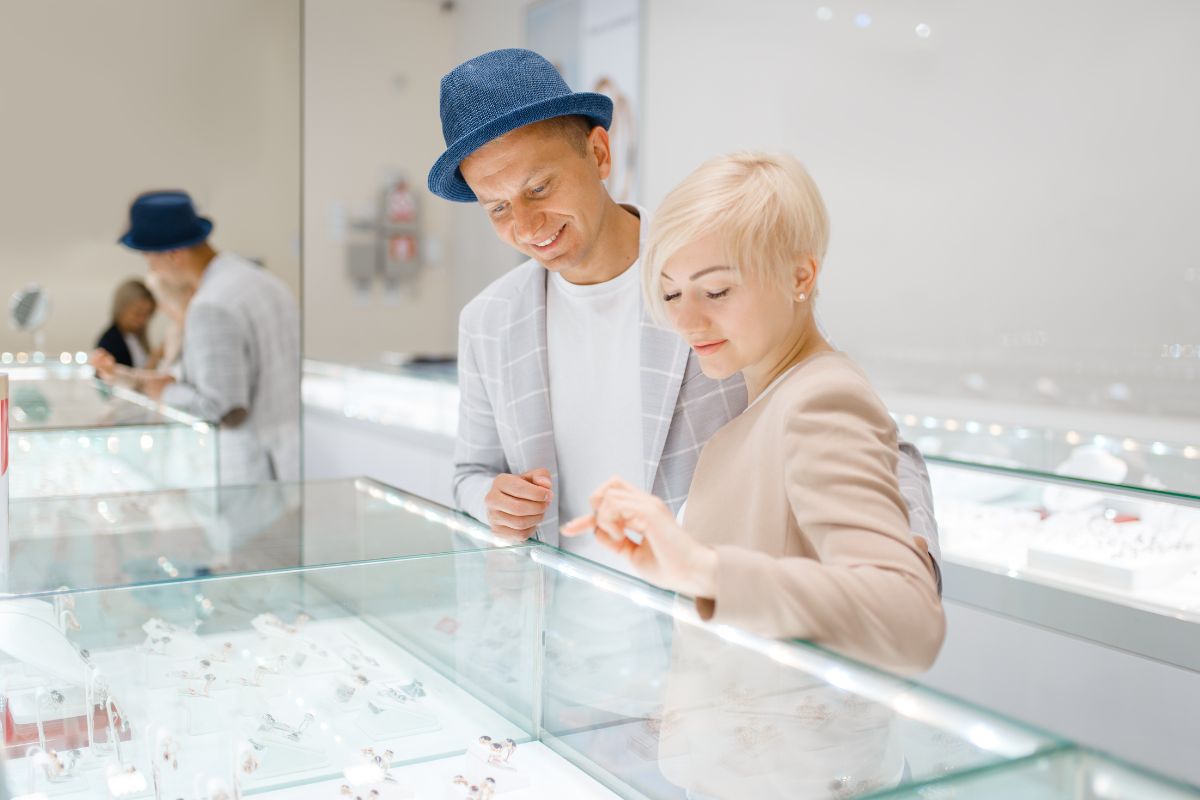 A couple buying diamonds from a retail shop