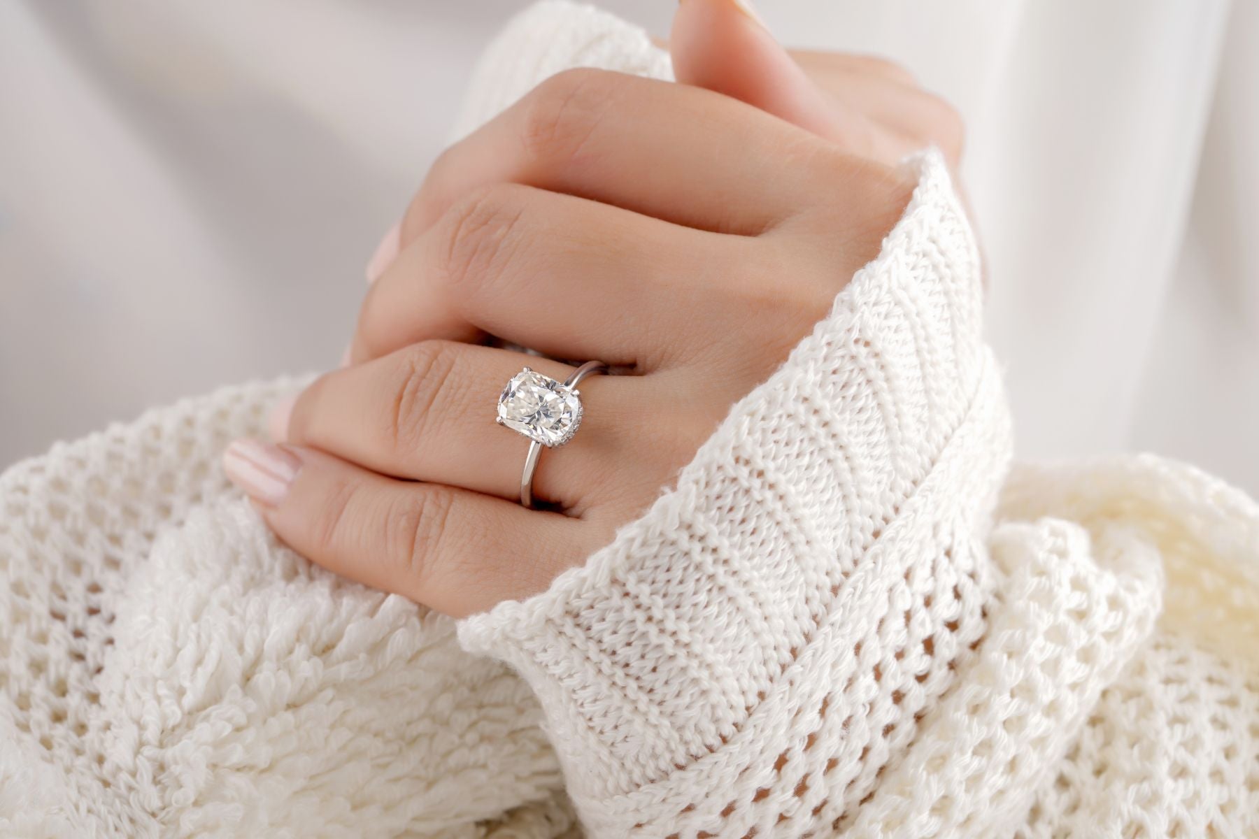 A fit woman wearing a Moissanite Ring