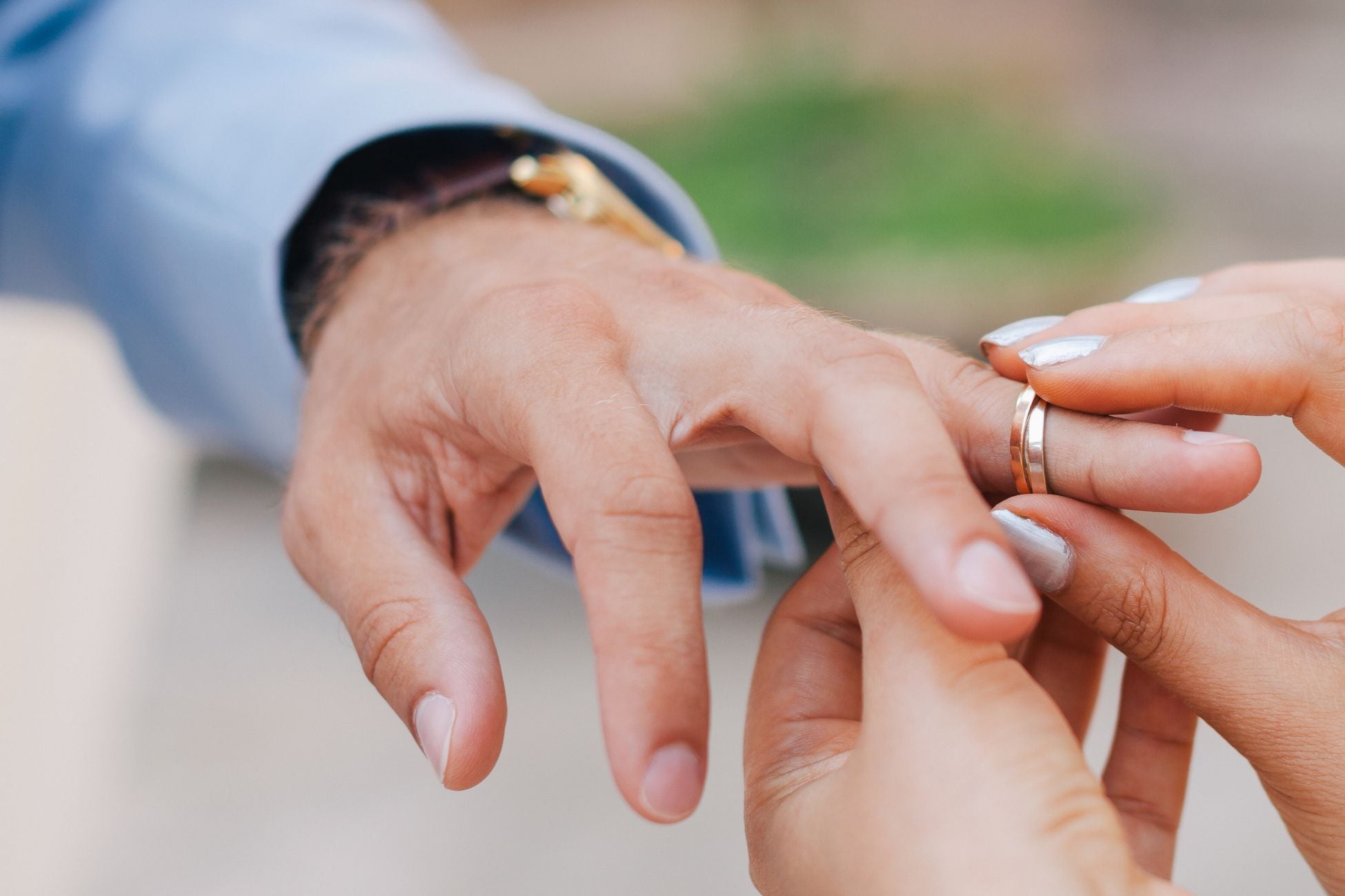 A girl giving her boyfriend an engagement ring