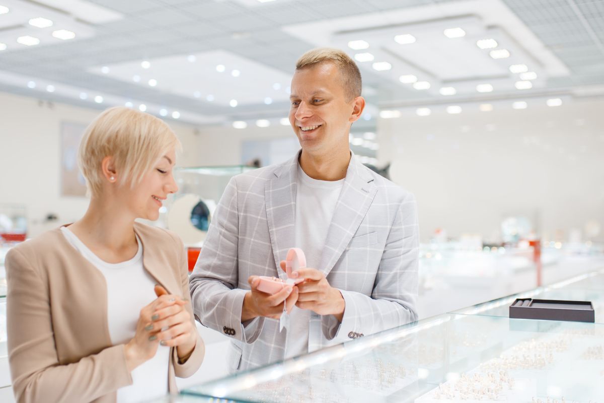 A guy buying an expensive engagement ring for his future wife