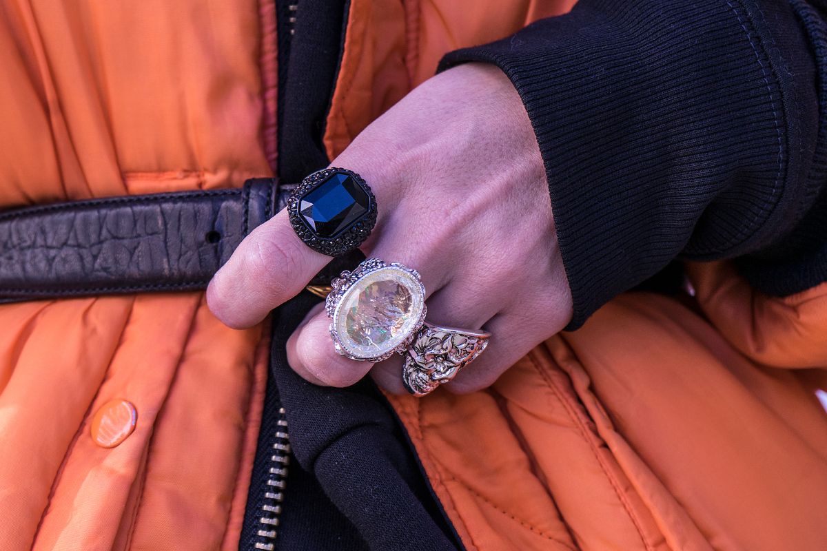 A hand wearing Fashion and Statement Rings