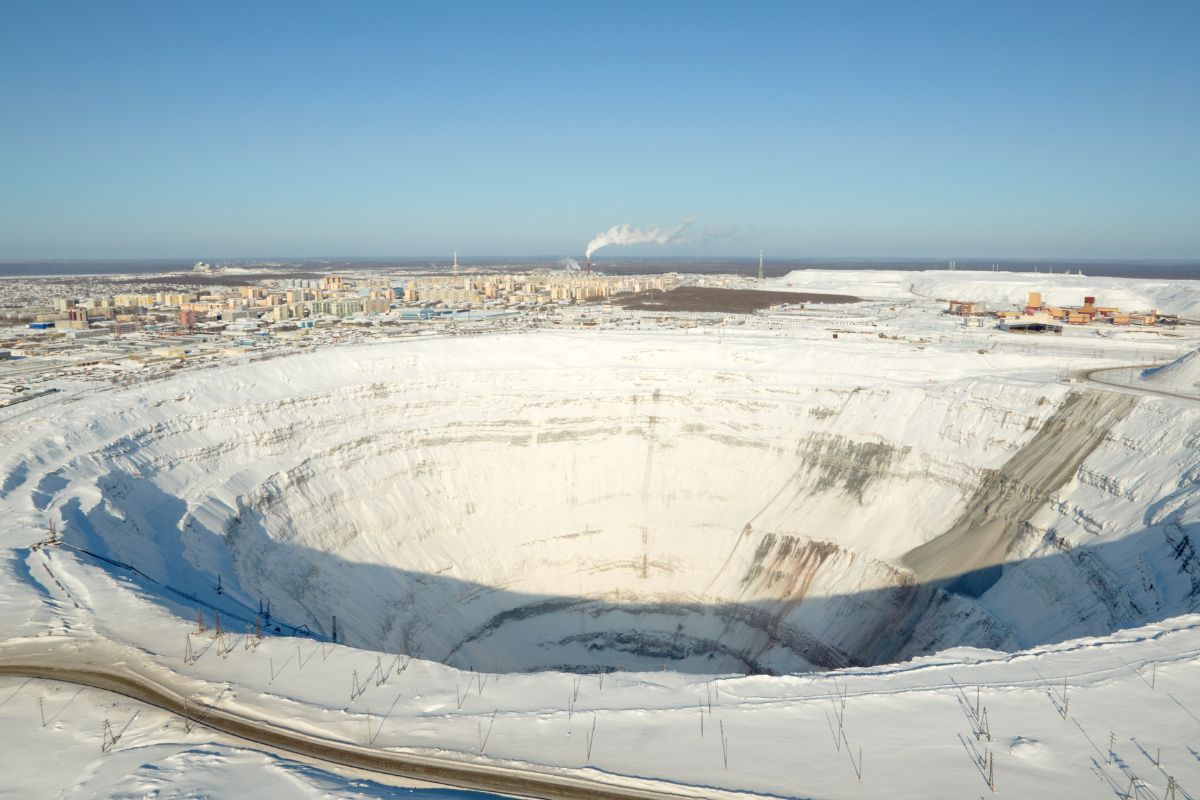A huge diamond mine's top view creating bad impact on environment.