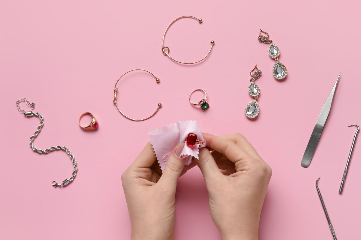 A lady cleaning her rose gold ring