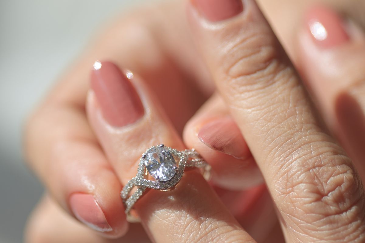 A lady wearing a beautiful lab grown diamond ring.