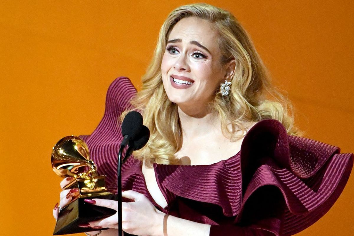 Adele winning grammy award