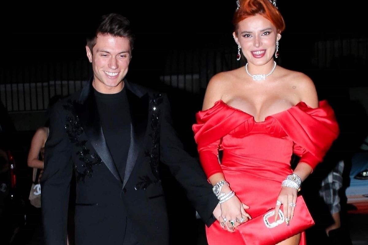 Bella Thorne wears a stunning red dress at her engagement party with fiancé Benjamin Mascolo.