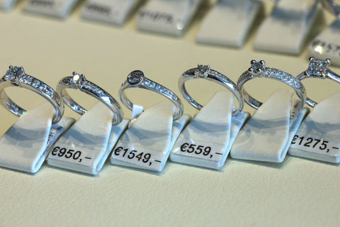 Collection of diamond nexus and moissanite ring under different price tags