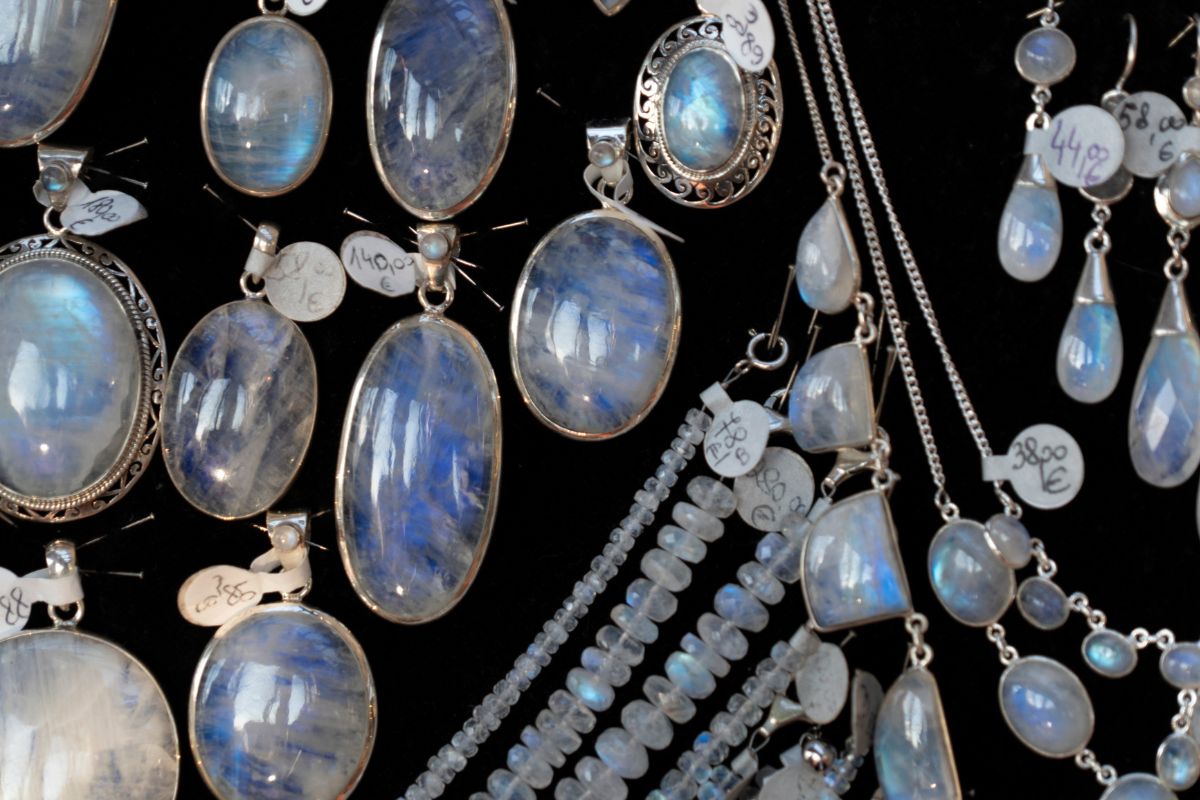 Collection of moonstone and rainbow stone jewelry.