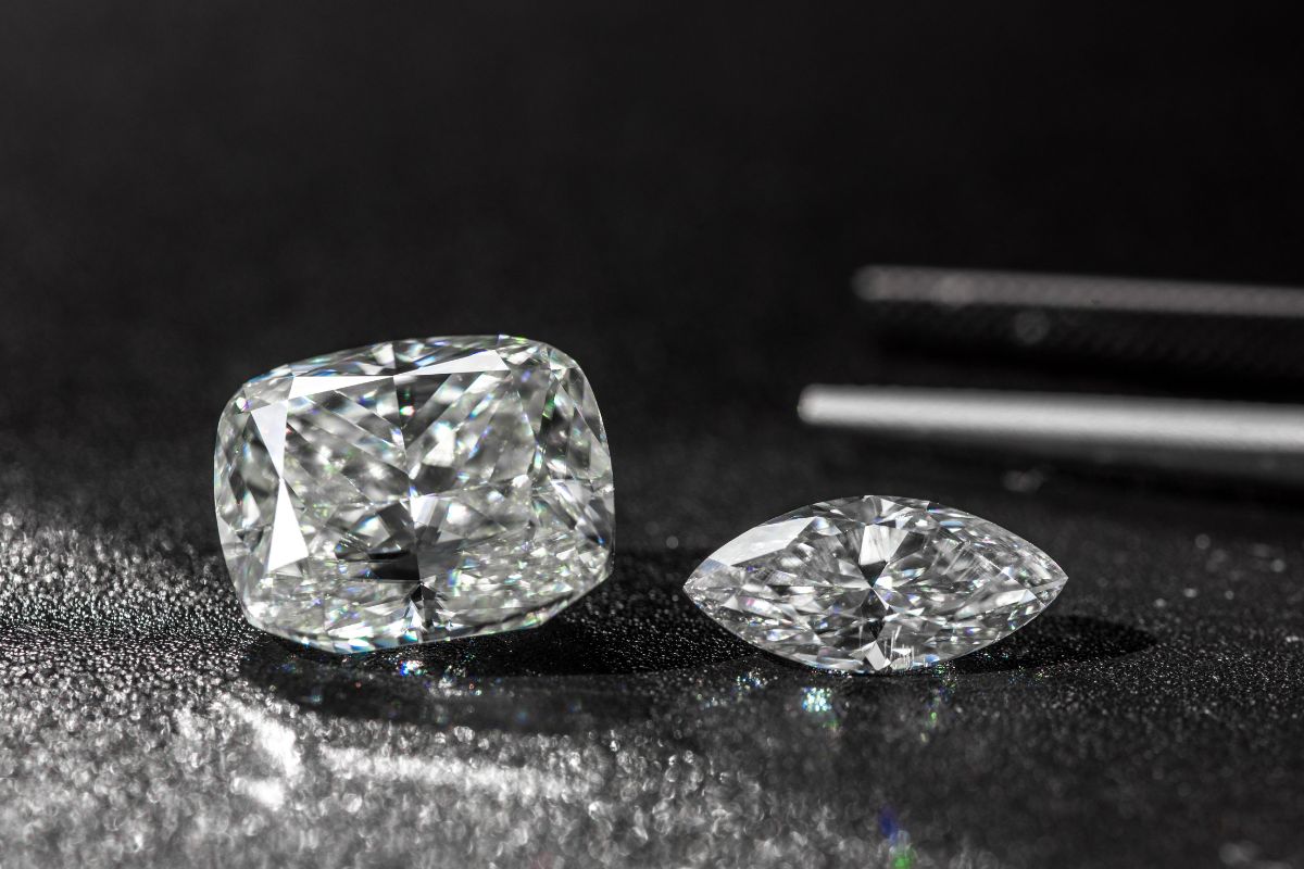 Cushion cut on the left and round cut solitaire diamond on right