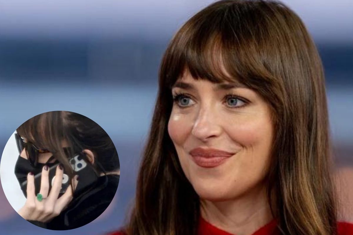 Dakota Johnson showing off her engagement ring