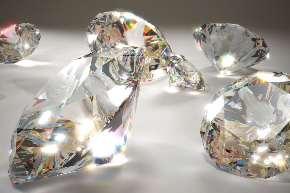 Different carat sparkling K color diamonds.