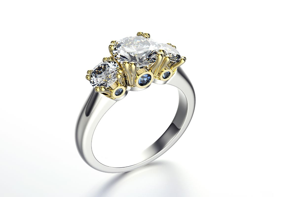 A beautiful three stone old mine diamond cut ring