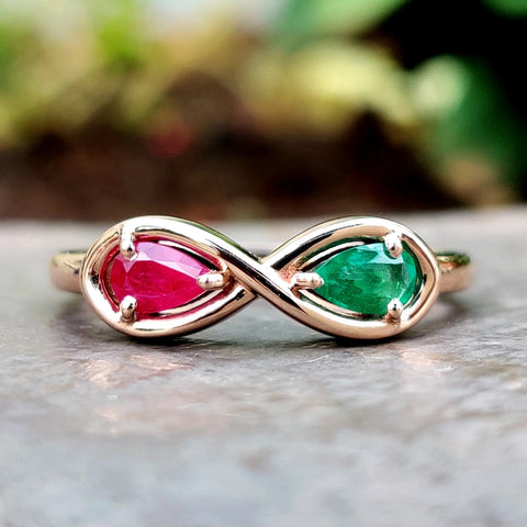 0.47 TW Pear Shape Ruby and Emerald Infinity Style Unique Wedding Band