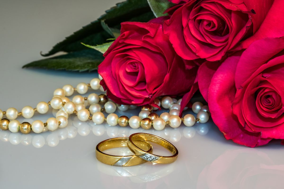 Two beautiful engraved wedding ring kept together.