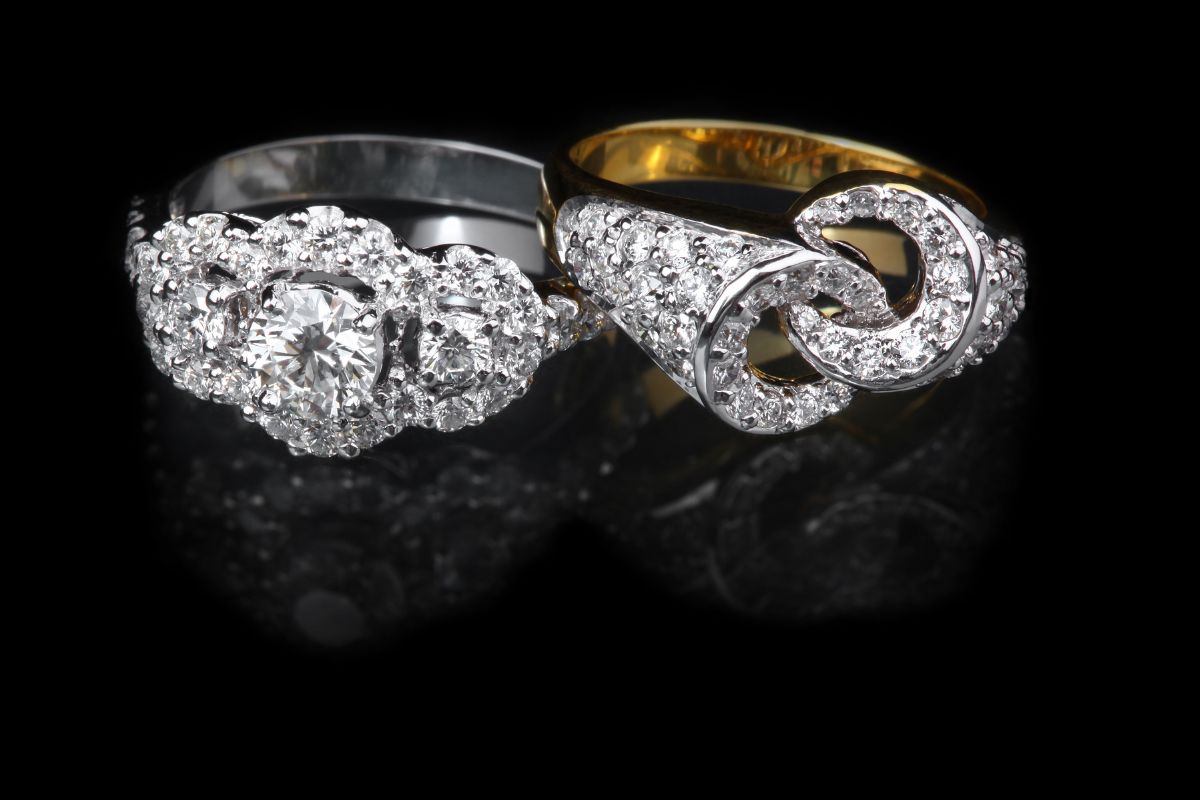 Two beautiful personalized wedding ring kept together.