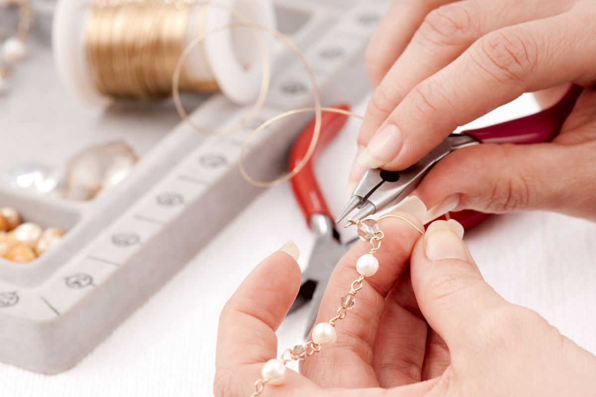 Wiring of pearls and bails together to make a bracelet.