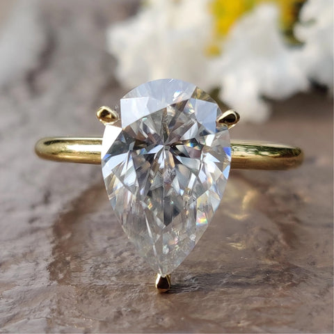 3.99 TCW Pear-Cut Hidden Halo Open Gallery Moissanite Engagement Ring
